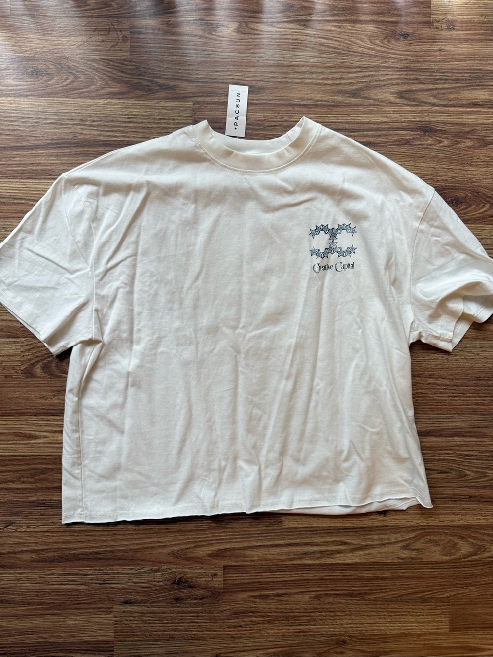 PacSun Cream Tee with Blue Star Logo